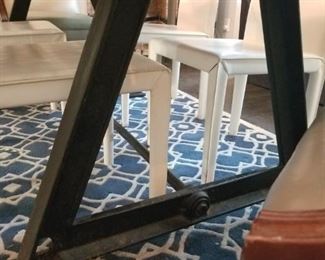 railroad metal underneath dining table