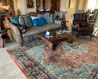 Coffee table and end tables have turquoise inlay. Leather recliner is super comfy.