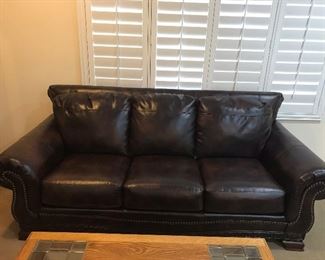 Second of two leather 88 inch wide sofas. In like new condition.