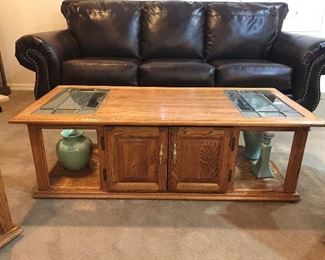 Oak coffee table with beveled glass.