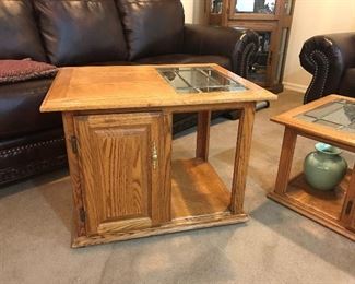 There are two matching oak end table that match the coffee table.