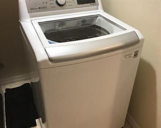 Samsung energy efficient washer. 36 inches wide and 69 1/2 inches deep. This is fairly new.