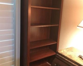 Wood bookcase is 69 inches tall and 31 inches wide. Like new condition.