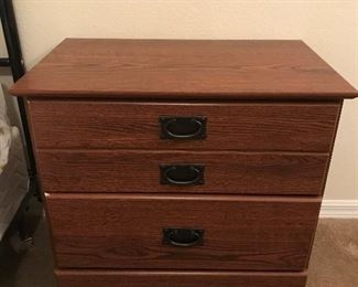 Nightstand 26 inches wide by 24 inches tall. Three drawer.
