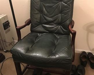 Black leather chair 26 inches wide.