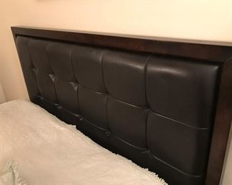 Nice padded headboard on queen bed.