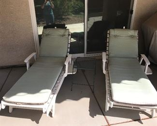 Set of two patio chaise lounges.