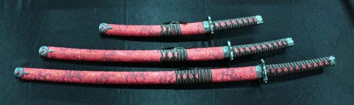 Set of Decorative Samurai And Katana Swords With Dragon Embossed Hilts And Pommels And Dragon And Floral Sheath 38"OL, 29"OL, 19"OL, Qty. 3