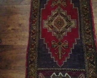Small rug - browns/reds