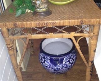 Rattan side table; cobalt blue planter