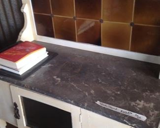 Stone top counter unit with tiled back