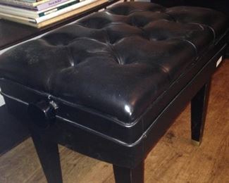 Small black tufted stool