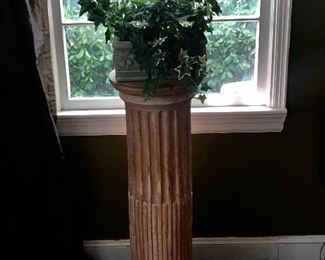 One of a pair of late eighteenth century French terra-cotta pillars 