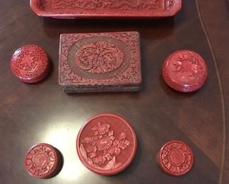 A collection of antique and new cinnabar collectables 