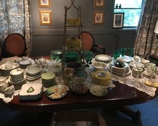 A table full of china and support pieces 