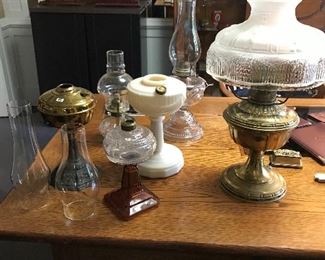 A wonderful collection of antique oil oil lamps