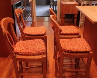 Pottery Barn counter stools with Cheetah patterned cushions