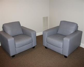 light gray leather club chairs