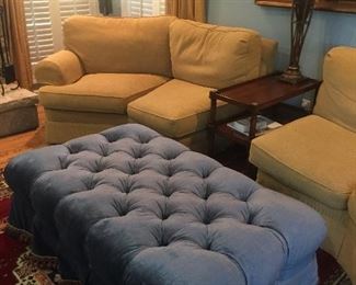 Large upholstered stool.