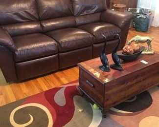 Leather sofa with recliner’s