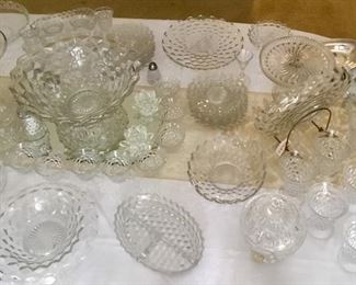 Large collection of American Fostoria glassware. Punch Bowl, pedestal, relish, tea glasses, juice glasses, console bowls, desert plates, vases, serving bowls etc.
