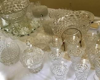 Large collection of American Fostoria glassware. Punch Bowl, pedestal, relish, tea glasses, juice glasses, console bowls, desert plates, vases, serving bowls etc.