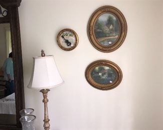 Antique oval picture frames with prints