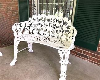 Cast aluminum bench, chairs and table