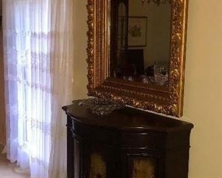 Painted console and antique framed mirror