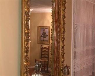 Close up of antique framed plate glass mirror.  Mirror glass was replaced replaced several years ago.  
