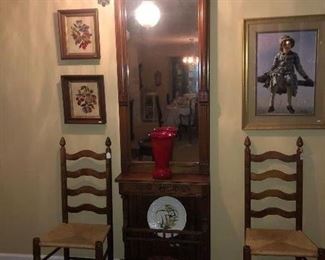 Antique eastlake pier mirror, shown here without the crown on top.  Flanked on either side with old Davis cabinet company walnut chairs.  