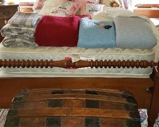 spiral bed, mattresses, old trunk