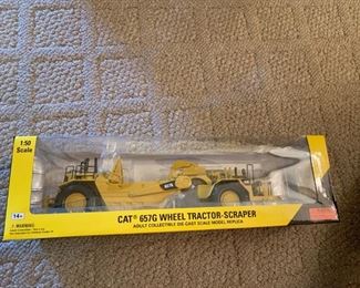 #53		CAT 657G Wheel tractor-Scraper Scale New in Box	 $75.00 
