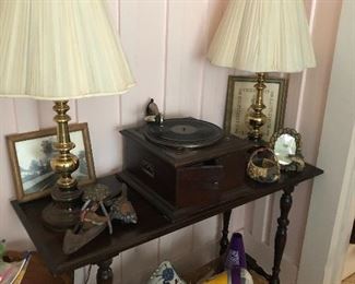 Nice mahogany sofa table. Old Victrola. Pair of brass lamps. Lots of cute pillows to choose from in this sale.