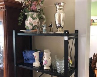 The dining room has lots of items at great prices. Old vases with colorful decorations. Mercury glass style vase. 