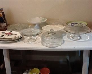 A large assortment of cake stands, and also a great variety of platters.