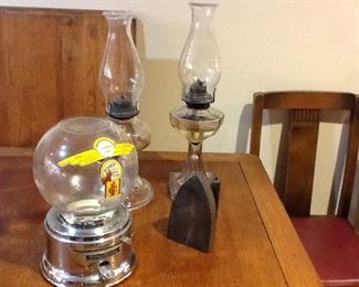 Two vintage oil lamps, and a fabulous Ford Ball Gum 1 cent machine!