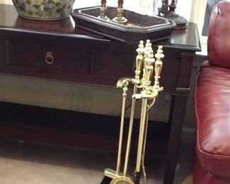 Brass fireplace equipment, and we also have a fireplace screen that came from Crate and Barrel.