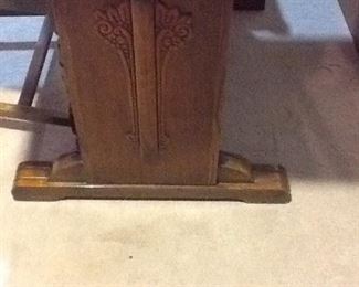 This is a unique kitchen set. Notice the lovely detail on the table.