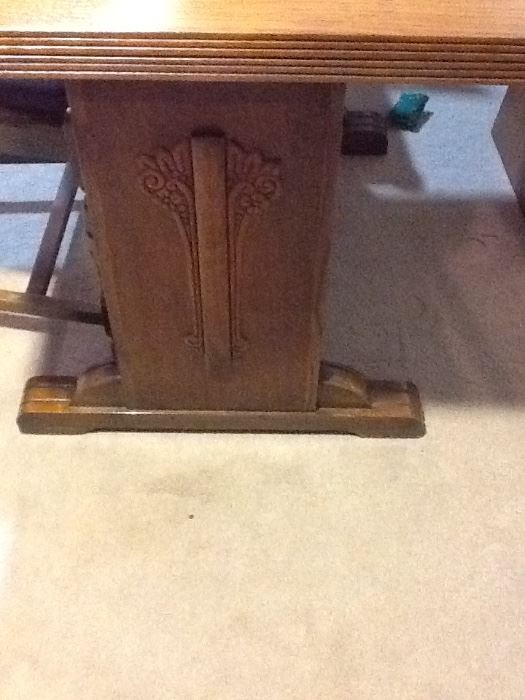 This is a unique kitchen set. Notice the lovely detail on the table.