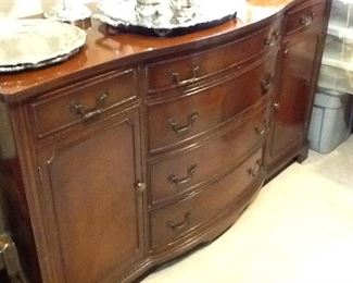Mahogany buffet with felt lined silver drawers.