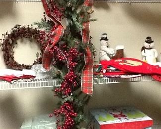 In the center you will see a terrific stair swag. We also have stockings to offer for sale.