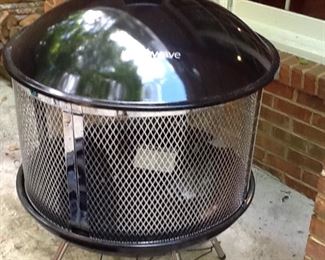 Never been used outdoor fire pit, with cover.