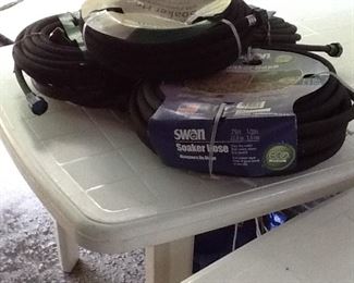 Several garden soaker hoses