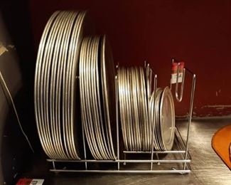 Pizza Pans assorted sizes in stands