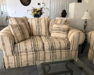 Quality sofa and love seat - as good as new. No pets in house.