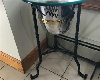 Accent table can be used to chill wine. Bucket removable