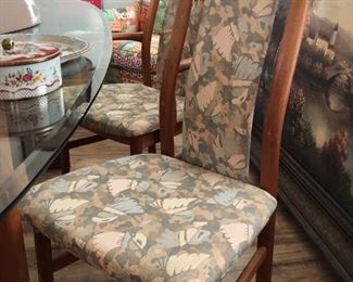 Mid Century modern Danish teak dining set with four chairs.