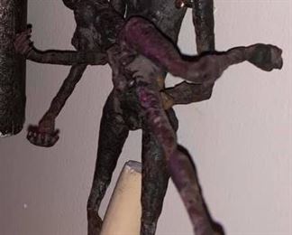 OLD IRON SCULPURE MAN HOLDING LADY  7" LADY COMES OUT OF ARMS