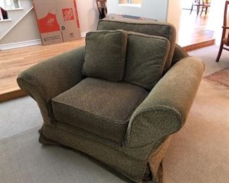 Matching couch available.  Great neutral colored slip covers over off white covered chair in excellent condition